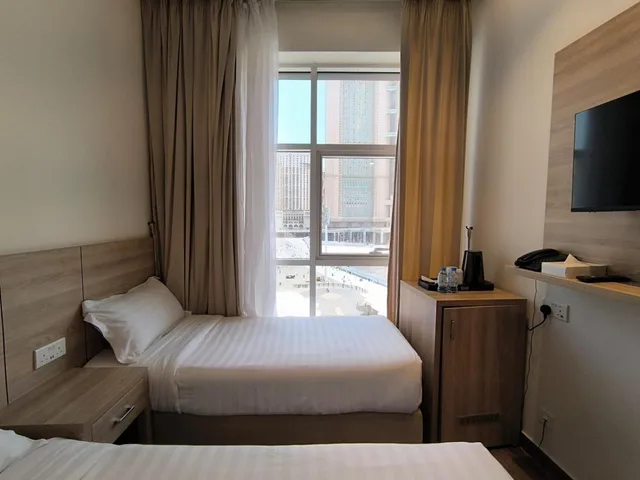 غرفة بسريرين منفصلين، فندق وورث إيليت(Worth Elite Hotel) 1/10