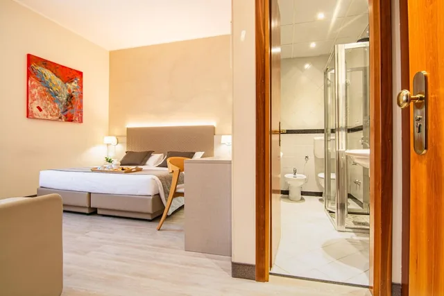 غرفة قياسية رباعية بسريرين منفصلين مع سرير سحّاب إضافي مع أريكة، Park Hotel Ai Pini 5/6