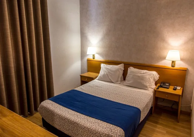 غرفة ثلاثية بثلاثة أسرّة، Columbano Hotel Residencial 1/2