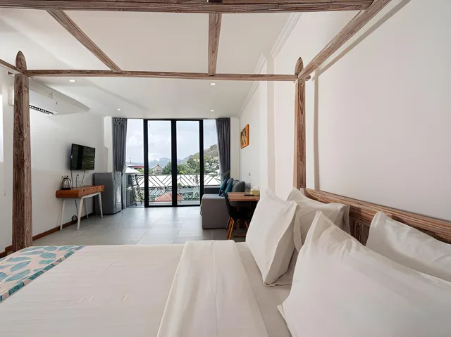 غرفة ديلوكس بسرير كوين، Komodo Suites Downtown 1/2