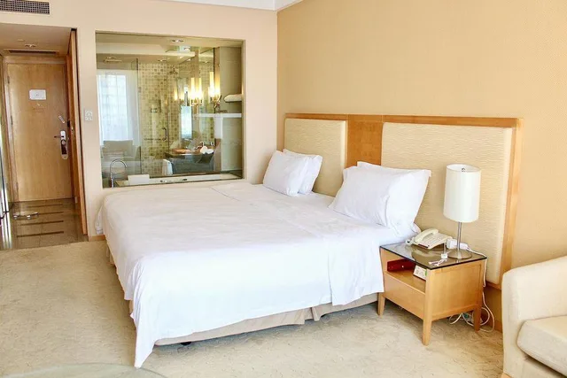 غرفة بسرير كينج وسرير كوين، Haiyue Jianguo Hotel 1/2