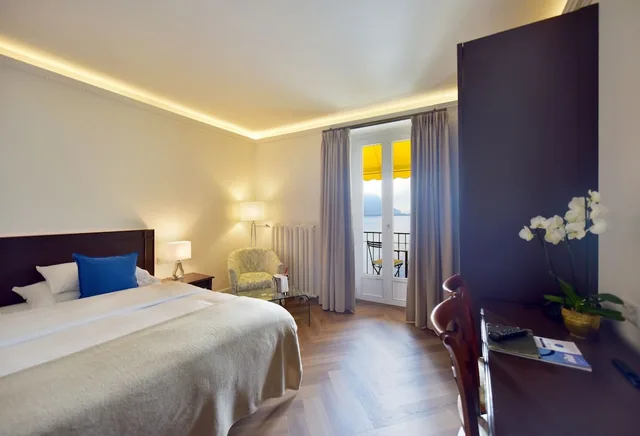 غرفة سوبيريور ثلاثية بثلاثة أسرّة بإطلالة على البحيرة، GOLF HOTEL RENE CAPT 2/5