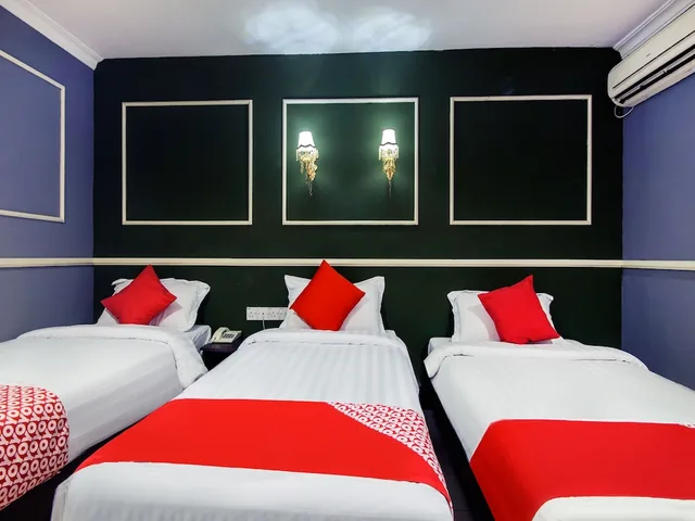 جناح سوبيريور بسرير مزدوج وسرير فردي، OYO 761 City Hotel 2/3