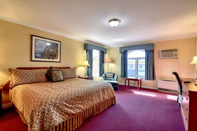 غرفة قياسية بسرير كينج في المبنى الرئيسي، Roosevelt Inn And Suites 1/5