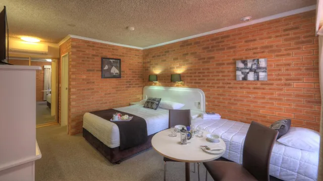 غرفة بسريرين منفصلين، COUSINS MOTOR INN 2/2