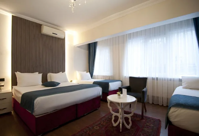 غرفة ديلوكس بسرير كوين وسرير فردي، Nar Sultan Hotel 10/10