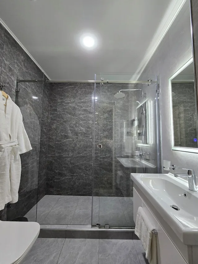 غرفة ديلوكس ثلاثية بثلاثة أسرّة، Garnet Hotel Tashkent 3/4