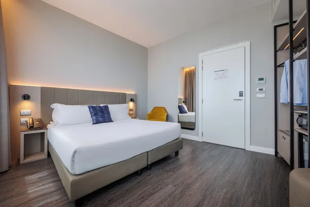 غرفة قياسية بسريرين منفصلين، iH Hotels Milano Centrale 1/3