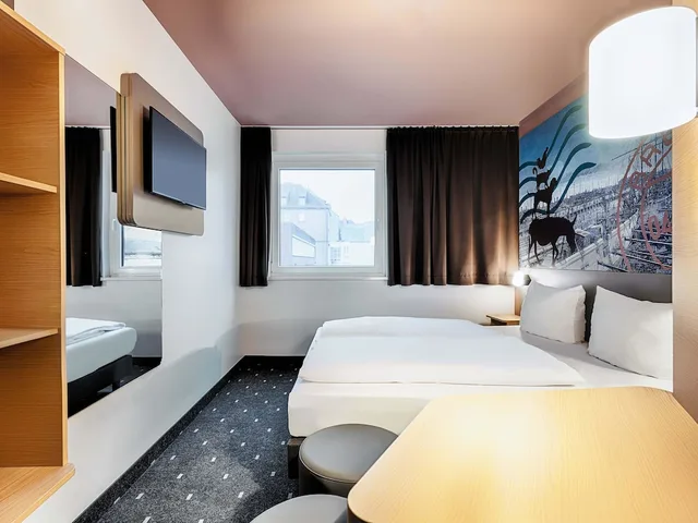 غرفة بسرير كوين، B&B Hotel Bremen-City 7/7