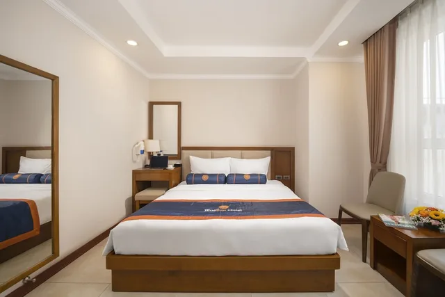 غرفة ديلوكس بسرير كينج بإطلالة جزئية على البحر، BlueSun Danang Beach Hotel 7/10
