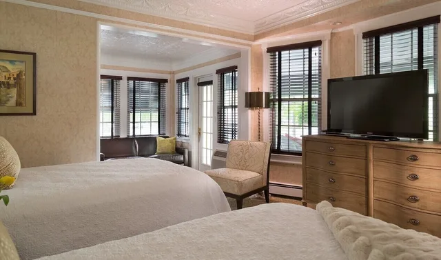 غرفة بسريرين مزدوجين، The Chateau Inn and Suites 2/5