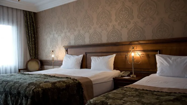 غرفة عائلية بسرير كينج وسرير فردي بإطلالة على المدينة مع أريكة، FERMAN HOTEL 6/11