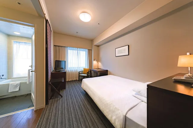 غرفة بسرير نصف مزدوج للمدخنين، Centrair Hotel 5/5