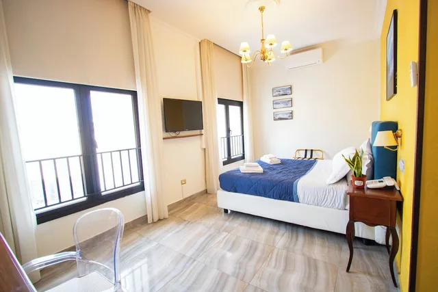 Superior, Double Bed, Ostello Bello Napoli 1/9
