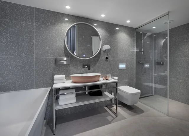 غرفة ديلوكس بسرير كينج مع أريكة بمطبخ صغير، Nordic Hotel Forum, WorldHotels Distinctive 2/2
