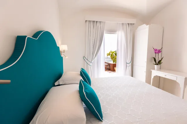 غرفة بسرير كوين، Hotel Conca d'Oro 1/2