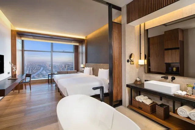 غرفة بسريرين منفصلين بإطلالة على النهر، Aoluguya Hotel 3/3