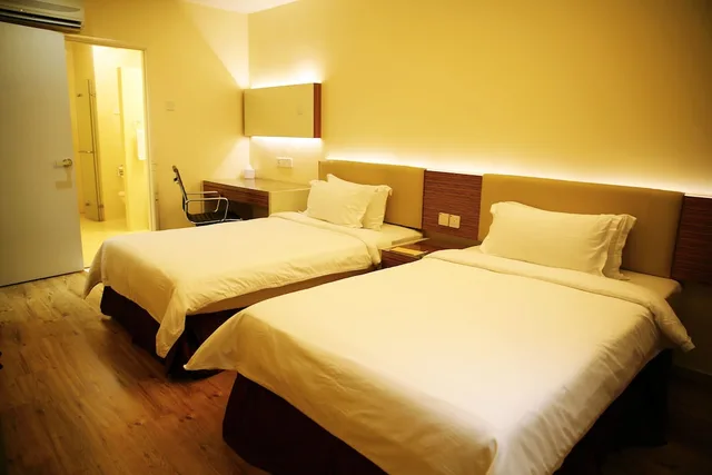 جناح بسرير كينج وسريرين منفصلين بغرفتي نوم، Ixora Hotel Penang 1/4