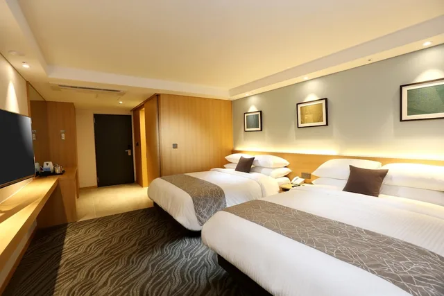غرفة عائلية رباعية بسريرين مزدوجين بإطلالة على المدينة بشرفة، Seogwipo JS Hotel 3/6
