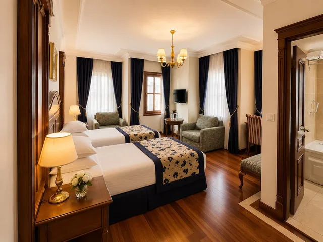 جناح متصل بسريرين كوين بغرفتي نوم مع أريكة، GLK Premier The Home Suites and Spa 7/10