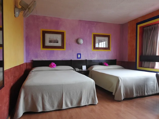 غرفة سوبيريور رباعية بسرير كينج وسريرين منفصلين، Hotel Benedicta 1/3