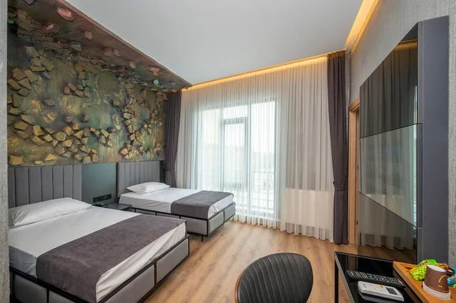 غرفة ديلوكس ثلاثية بسرير مزدوج وسرير فردي، Continental Airport Hotel 2/5