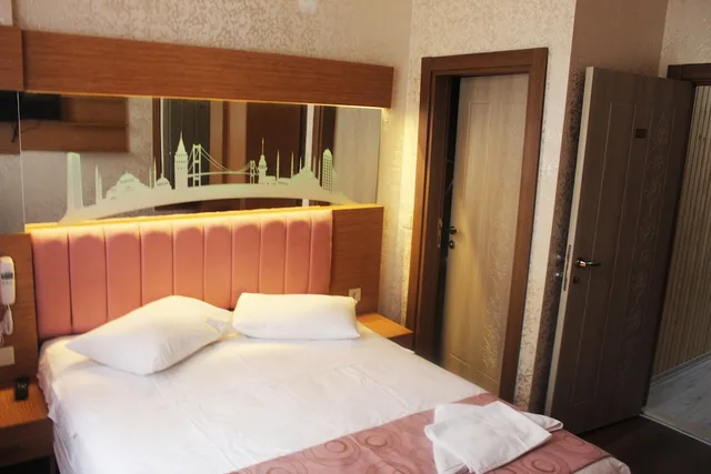 غرفة اقتصادية بسرير كوين، Megaron Hotel 1/7