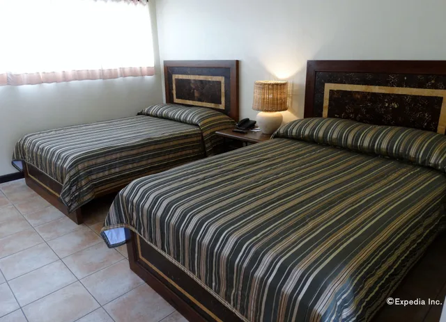 غرفة ديلوكس بسرير كوين، Citystate Asturias Hotel Palawan 10/10
