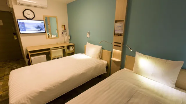 غرفة بسريرين منفصلين للمدخنين، Toyoko Inn Satsuma Sendai Eki Higashi Guchi 7/10