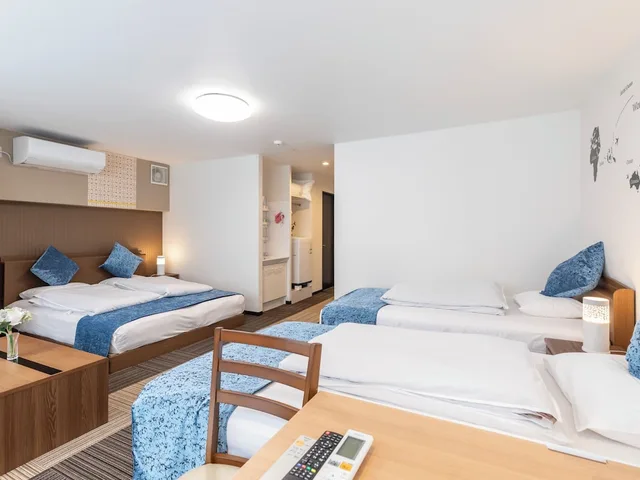 غرفة عائلية بسريرين منفصلين وسرير كينج وسرير فردي مع أريكة، Sakuragawa Riverside Hotel 2/10