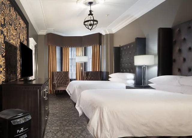 غرفة رباعية بسريرين مزدوجين، Le Pavillon Hotel 3/6