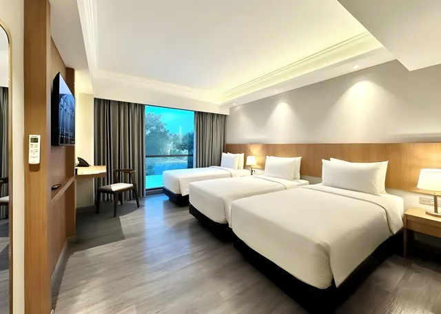 غرفة عائلية ثلاثية بسرير كوين وسريرين فرديين، The Malioboro Hotel & Conference Center 1/1
