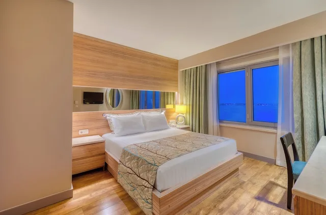 غرفة قياسية بسريرين منفصلين بإطلالة على الحديقة، Melas Resort Hotel Side 1/5
