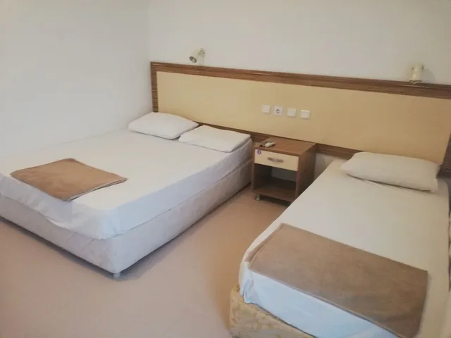 غرفة عائلية ثلاثية بسرير مزدوج وسرير فردي بإطلالة على المسبح، Unal Boutique Hotel 1/10