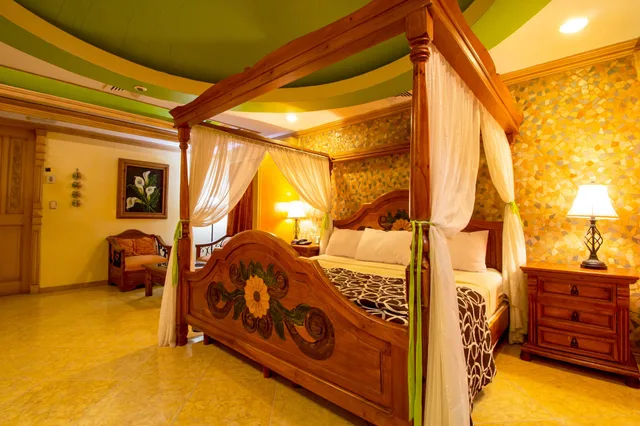 جناح ديلوكس بسرير كينج، Hotel Suites Flamboyanes by Kavia 1/2