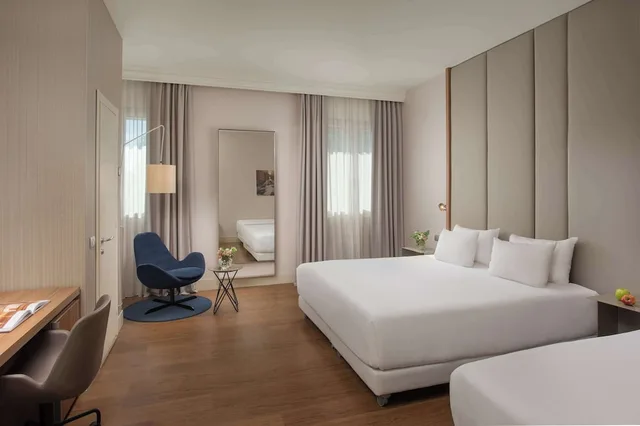 غرفة متصلة عائلية بسرير كوين وسريرين منفصلين، Nh De La Gare Hotel Bologna 1/7