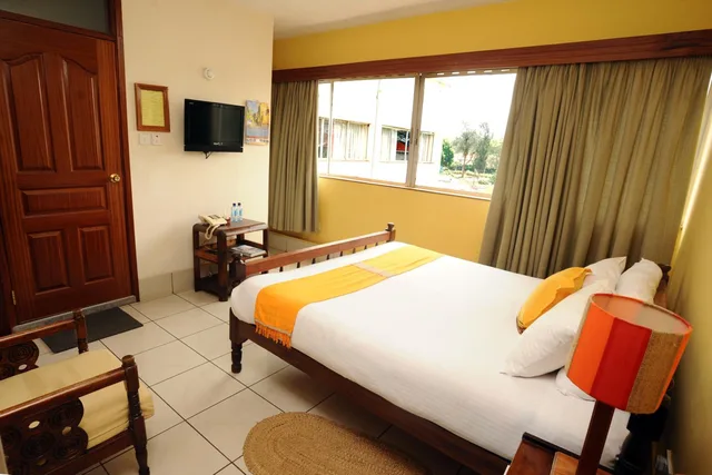غرفة عائلية، The Kenya Comfort Hotel Suites 4/6