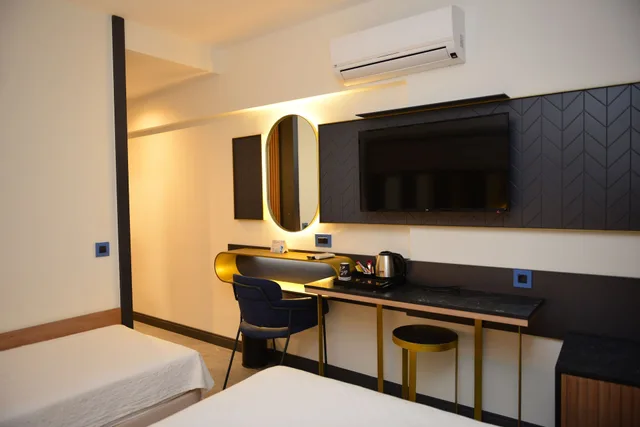 غرفة قياسية بسريرين منفصلين، Oasis Hotel 3/5