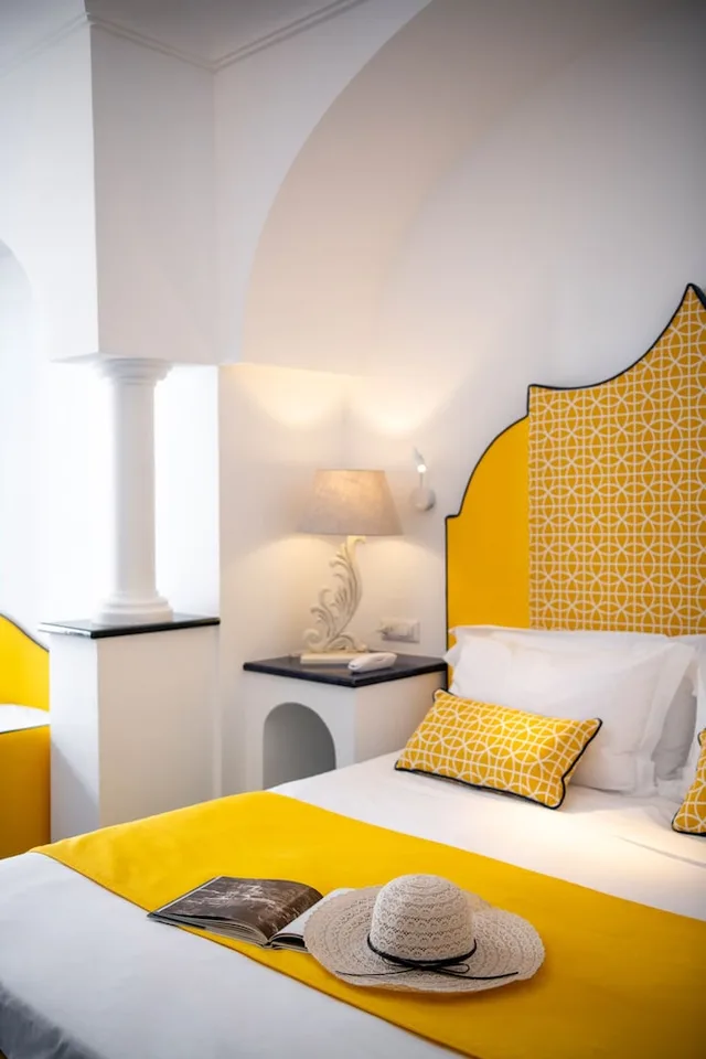 غرفة رباعية بأربعة أسرّة بإطلالة على البحر، Hotel Reginella Positano 1/3