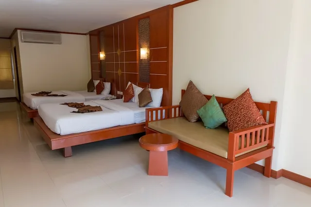 غرفة عائلية بسريرين مزدوجين بشرفة، LANTA CASUARINA BEACH RESORT 2/5