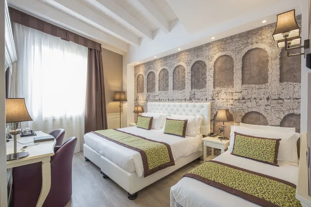 غرفة ديلوكس ثلاثية بسرير كينج وسرير فردي، Hotel San Pietro 1/3