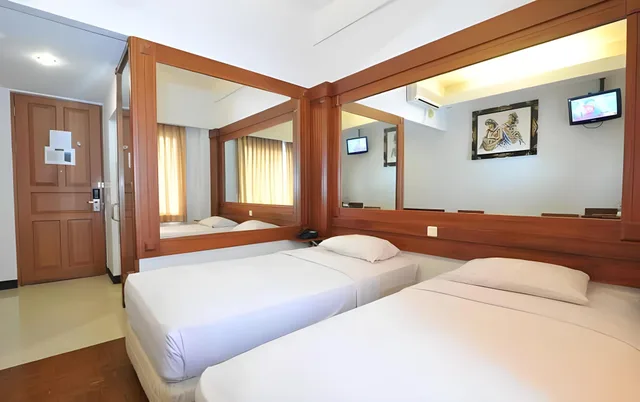 غرفة ديلوكس بسريرين منفصلين، Wirton Dago Hotel 1/3