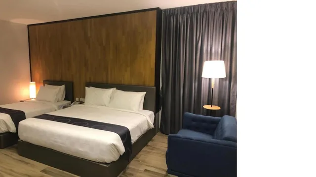 غرفة ديلوكس ثلاثية بسرير كينج وسرير فردي، FRAME HOTEL 3/3