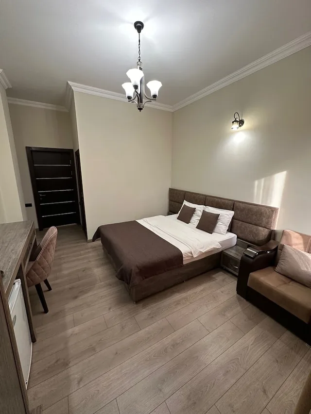 غرفة قياسية بسرير مزدوج أو سريرين منفصلين، Capital Hotel 2/4