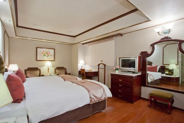 غرفة بسريرين منفصلين، Charming City Sungshan Hotel 1/9