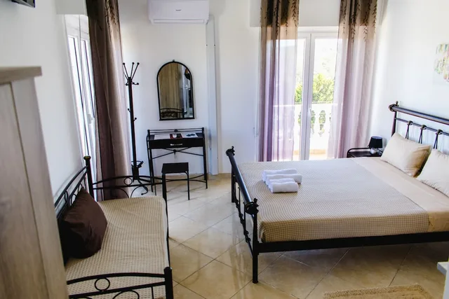 2 Bedrooms, Family, Triple, 1 Double and 1 Single Bed, Nikolakakis Rooms Lavrio 1/5