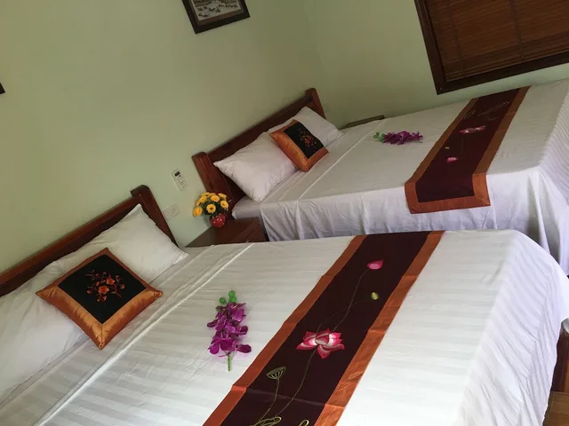 غرفة عائلية بسرير كوين وسرير فردي بشرفة، Tam Coc Tuan Minh Homestay 2/10