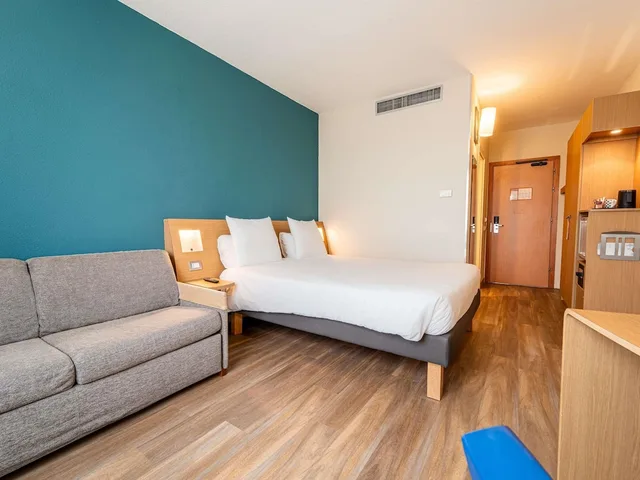 غرفة تنفيذية بسرير مزدوج مع أريكة، Novotel Roma Est 4/10