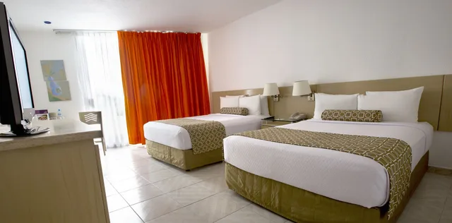 غرفة قياسية بسريرين مزدوجين بشرفة بإطلالة جزئية على البحر، HS Hotsson Smart Acapulco 7/10