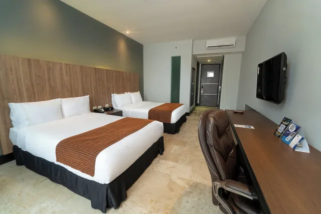 غرفة ديلوكس ثلاثية بسريرين مزدوجين، GHL Hotel Barranquilla 2/2